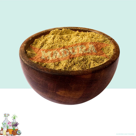 Wooden bowl filled with Fennel Seed Powder on a light blue background