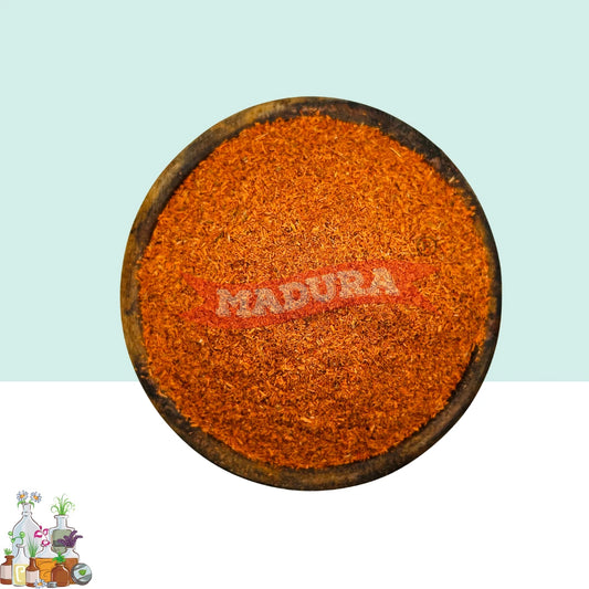 A wooden bowl with Manjista Scrub Powder with White and Blue Background