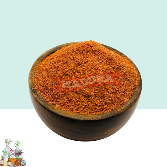A wooden bowl with Manjista Scrub Powder with White and Blue Background