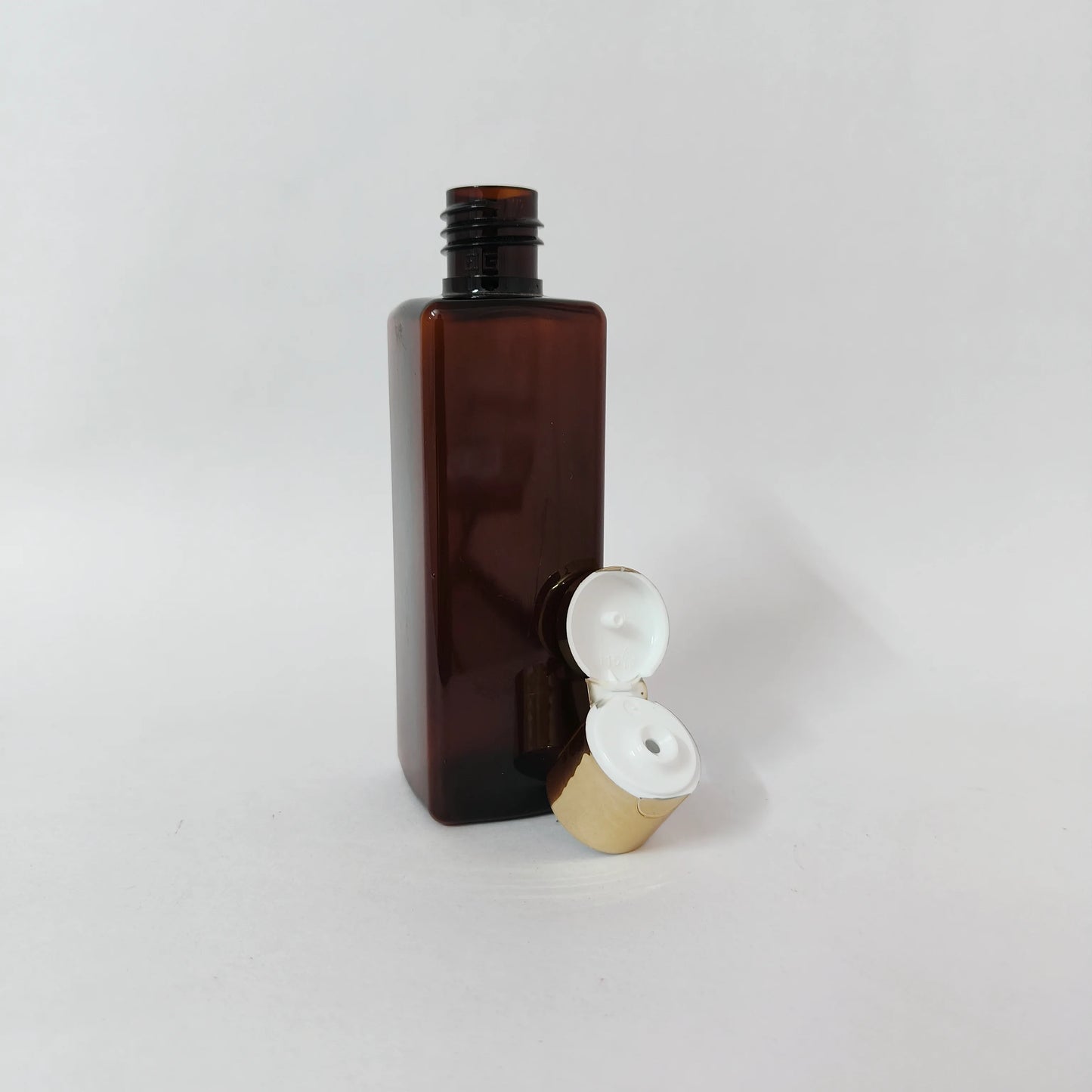 PET Square Bottle - Amber - 20mm Gold Flip Cap - 100mL
