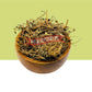 Wooden bowl filled with BhringarajDried