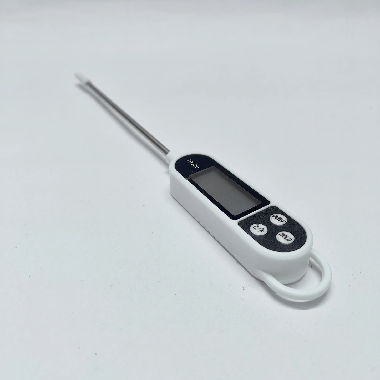 Digital thermometer with a long probe on a white background