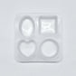 Set of silicone molds with different shapes on a light gray background