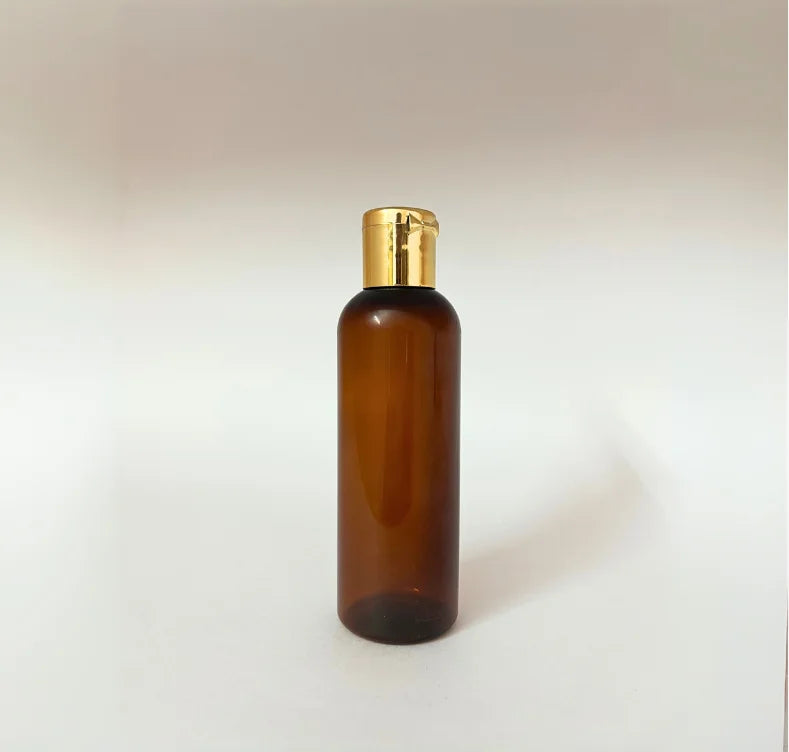PET Round Bottle - Amber - Gold Flip Cap - 100mL