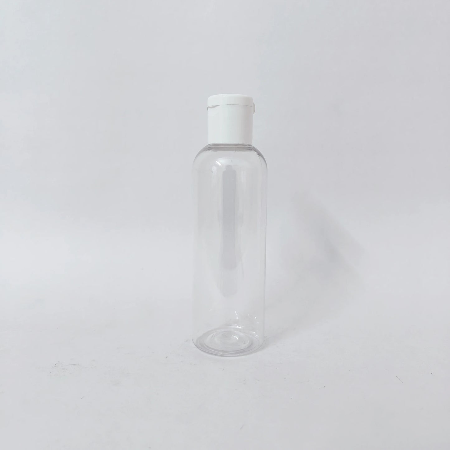 PET Round Bottle - Clear - 20mm White Flip Cap - 100mL