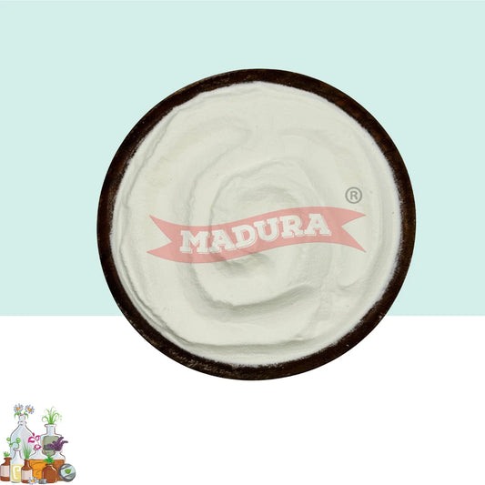 A top-down view of a white Papaya rawpowder  placed in a dark round bowl. The powder has a red watermark reading 'MADURA' across the center.